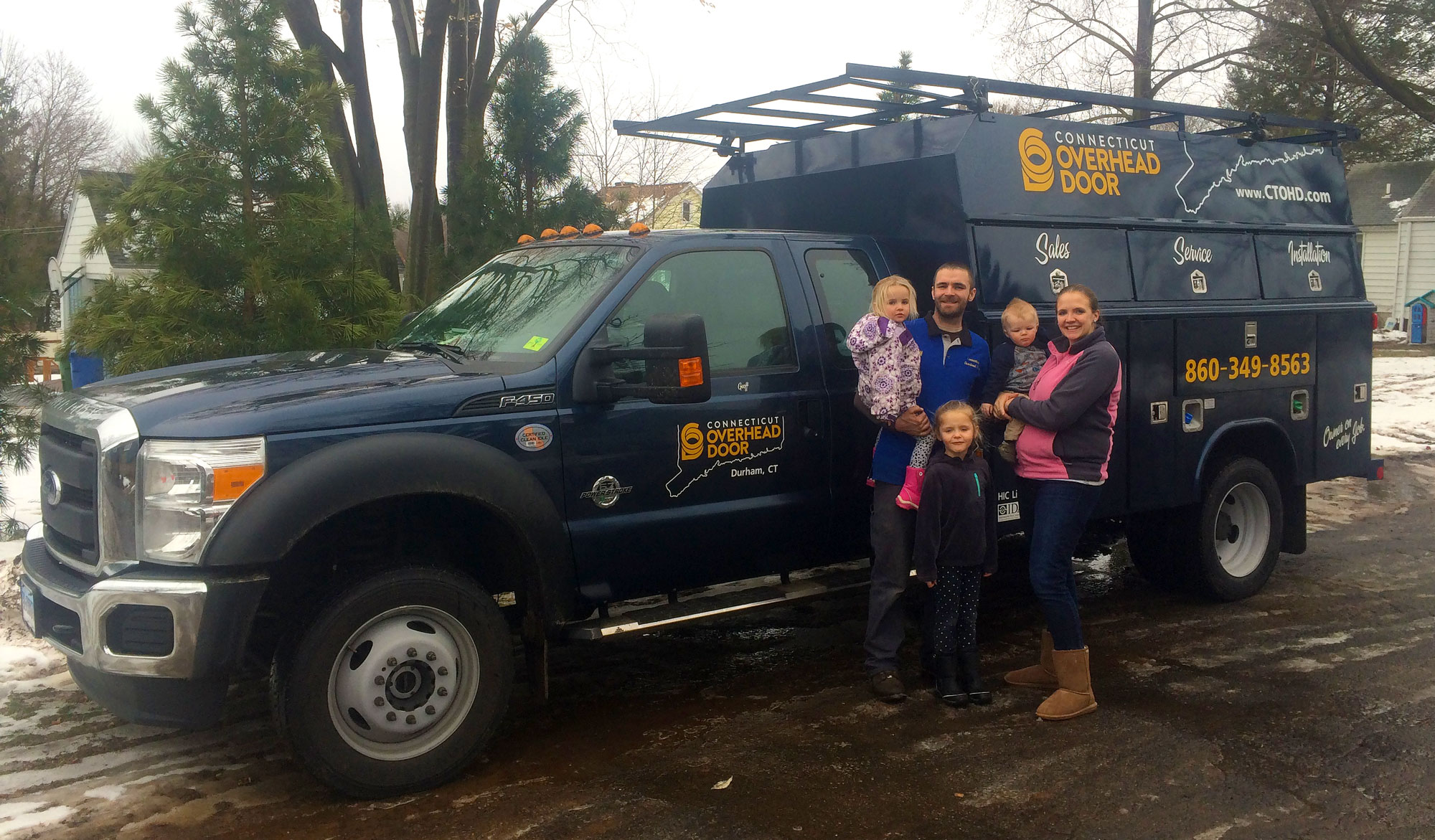 Connecticut Overhead Door service truck and family