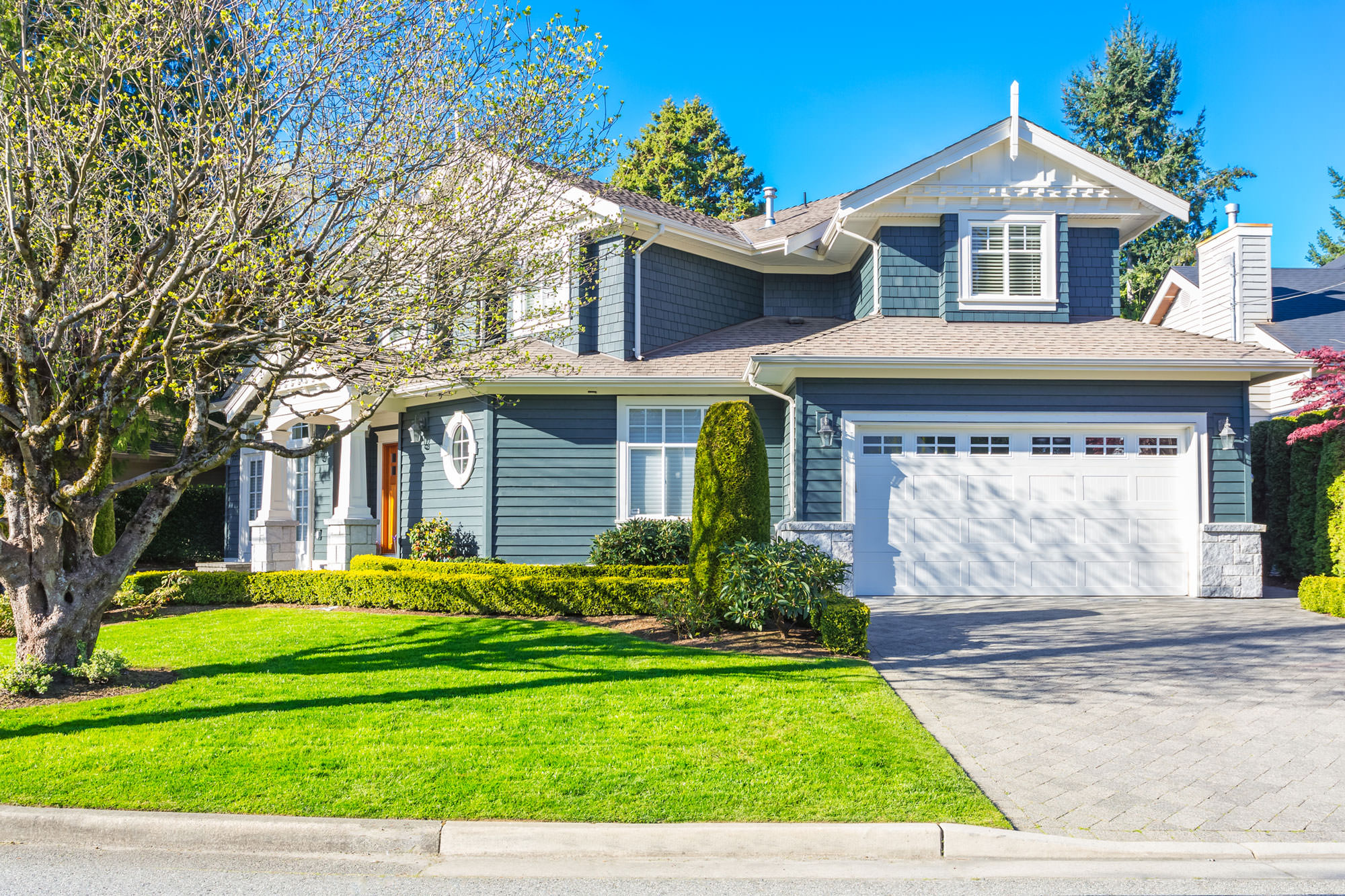 Installed residential garage door on a New England home